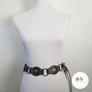 Brown belt with brass studs